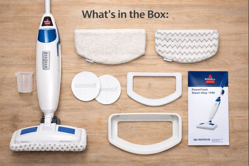 BISSELL PowerFresh Steam Mop accessories including microfiber mop pad, scrubber, fragrance discs, and measuring cup