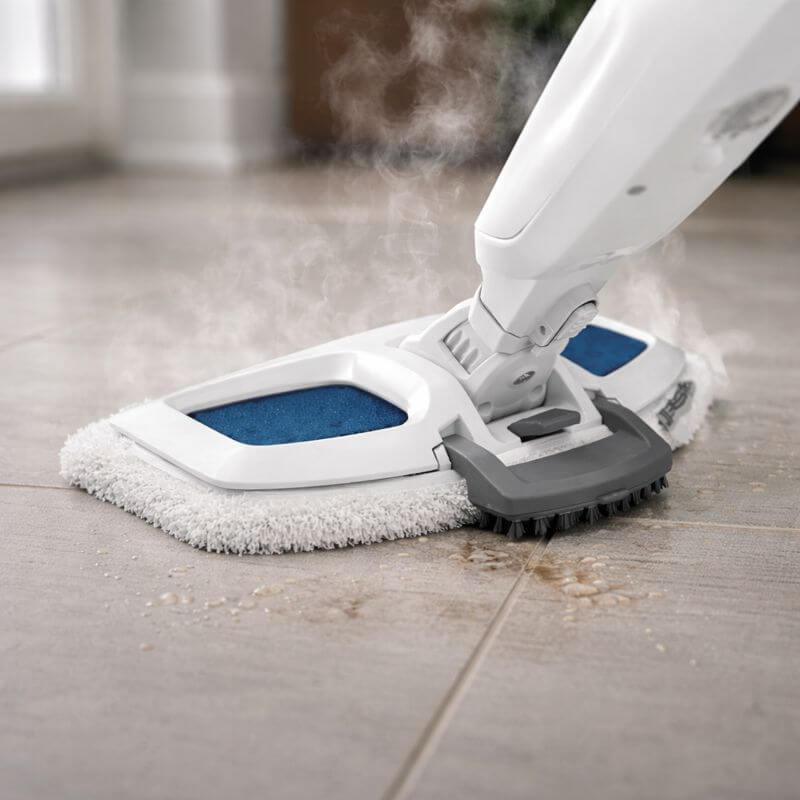 BISSELL PowerFresh Steam Mop built-in flip-down scrubber removing sticky floor mess