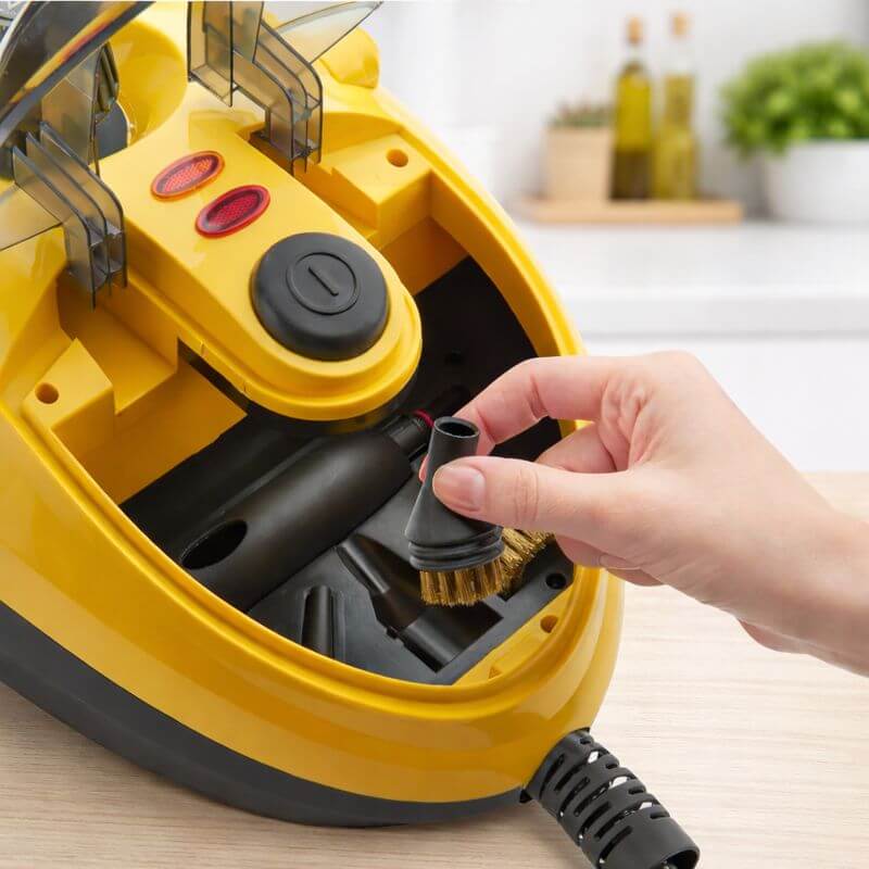 Wagner Spraytech 905e steam cleaner showing the built-in storage compartment holding cleaning accessories